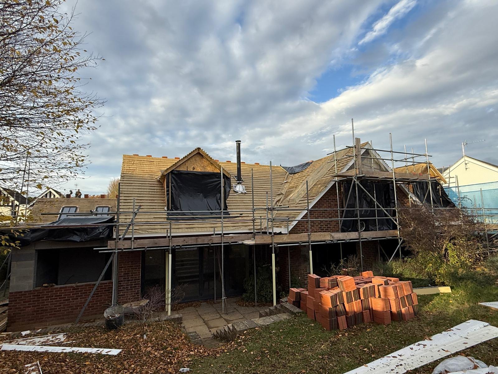House under scaffold with a new dormer for a loft conversion