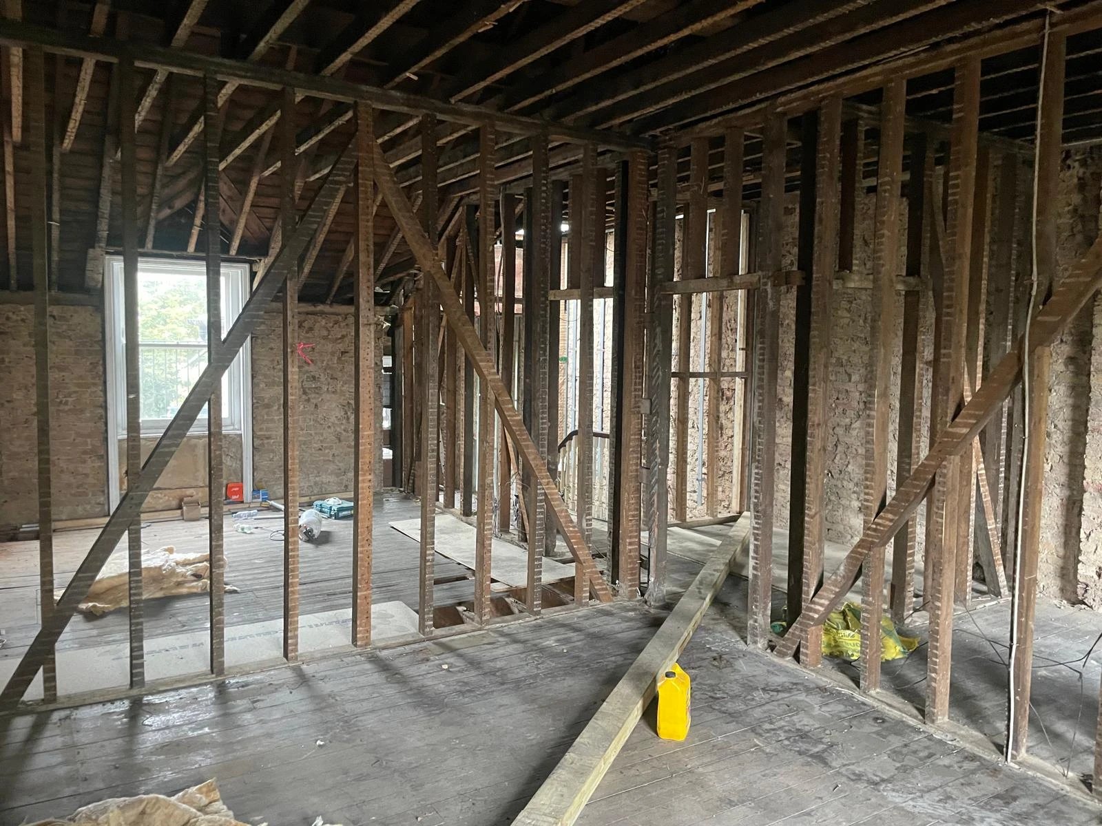Period house stripped back to its brick walls and old timber partitions